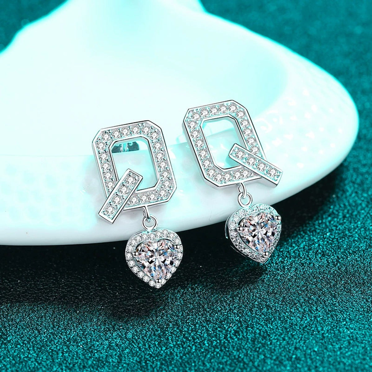 Heart Moissanite Stud Dangle Earrings with CZ in Rhodium-Plated S925 sterling silver product scene view showing angled setting detail