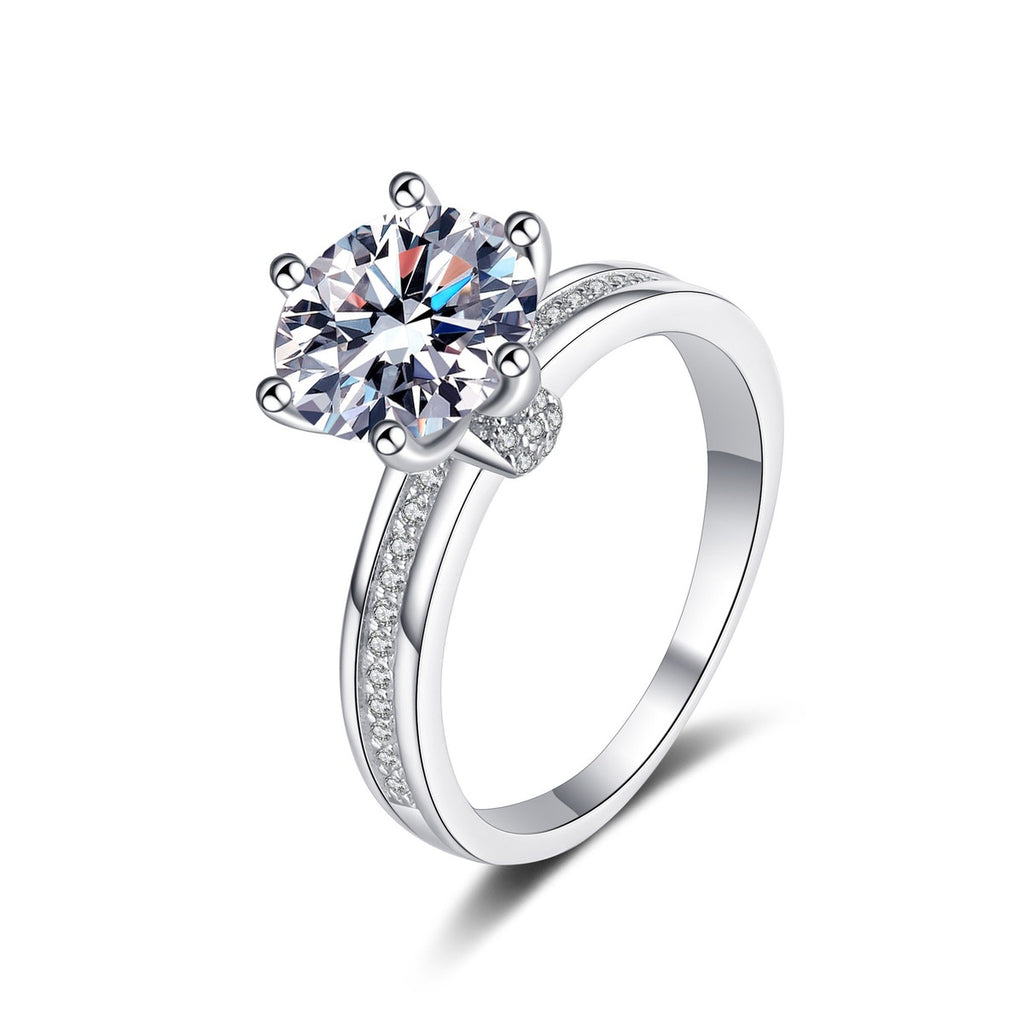 Round Moissanite Ring with CZ in rhodium-plated S925 sterling silver on clean white background