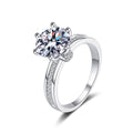 Round Moissanite Ring with CZ in rhodium-plated S925 sterling silver on clean white background