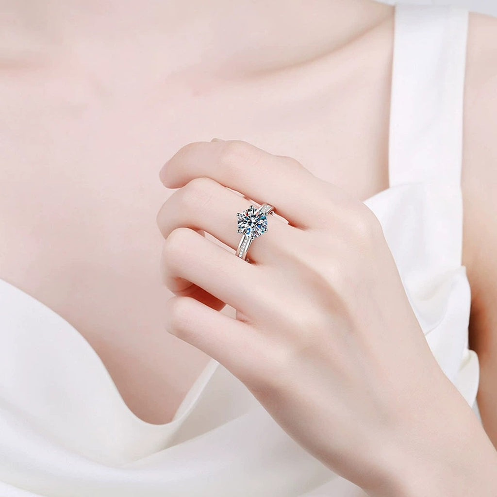 Round Moissanite Ring with CZ worn on hand to show scale and ring profile