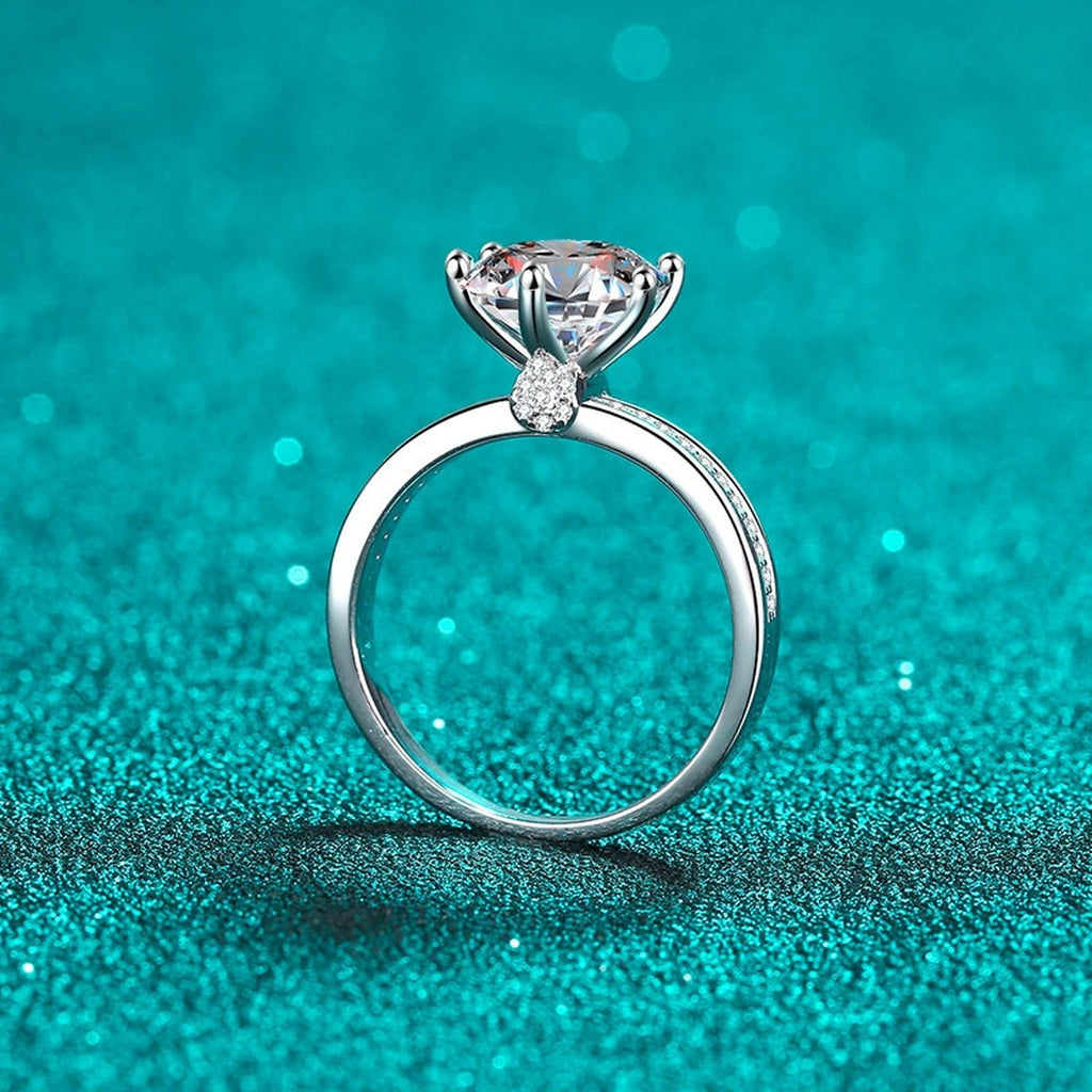 Round Moissanite Ring with CZ product view showing moissanite setting and rhodium finish