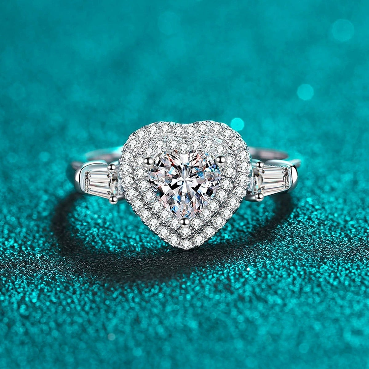 Heart Cut Moissanite Side Stone Engagement Ring with CZ in Rhodium-Plated S925 Sterling Silver blue display product photo showing the moissanite setting, stone cut, and band profile