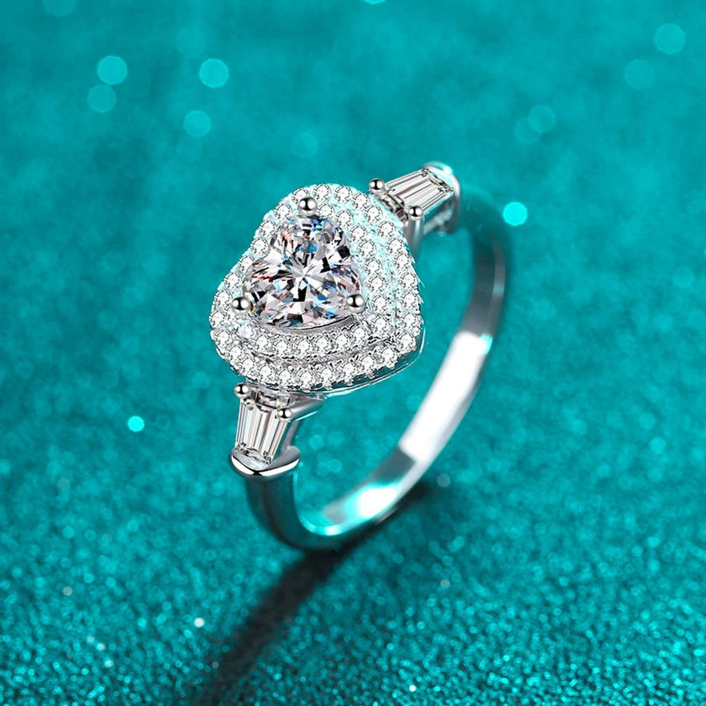 Heart Cut Moissanite Side Stone Engagement Ring with CZ in Rhodium-Plated S925 Sterling Silver blue display product photo showing the moissanite setting, stone cut, and band profile