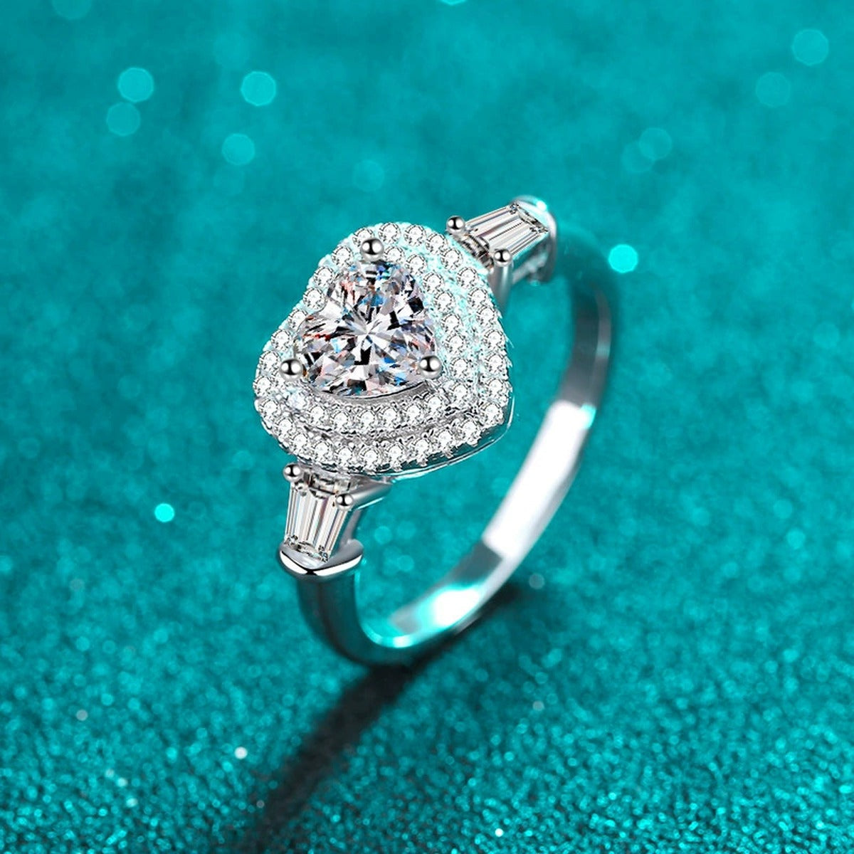 Heart Cut Moissanite Side Stone Engagement Ring with CZ in Rhodium-Plated S925 Sterling Silver blue display product photo showing the moissanite setting, stone cut, and band profile