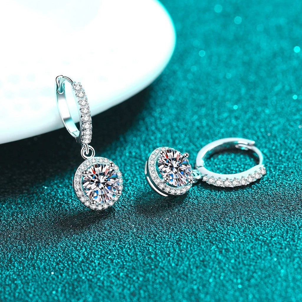 Round Halo Moissanite Hoop Dangle Earrings with CZ in Rhodium-Plated S925 sterling silver product scene view showing side profile, moissanite setting, and hoop dangle earrings design