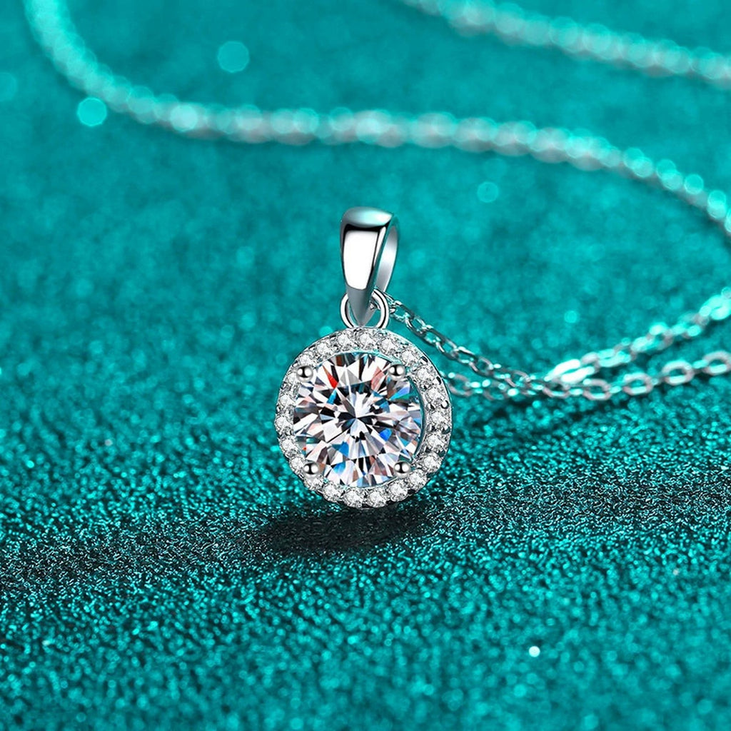 Round Halo Moissanite Pendant Necklace with CZ in Rhodium-Plated S925 sterling silver product scene view showing angled sparkle
