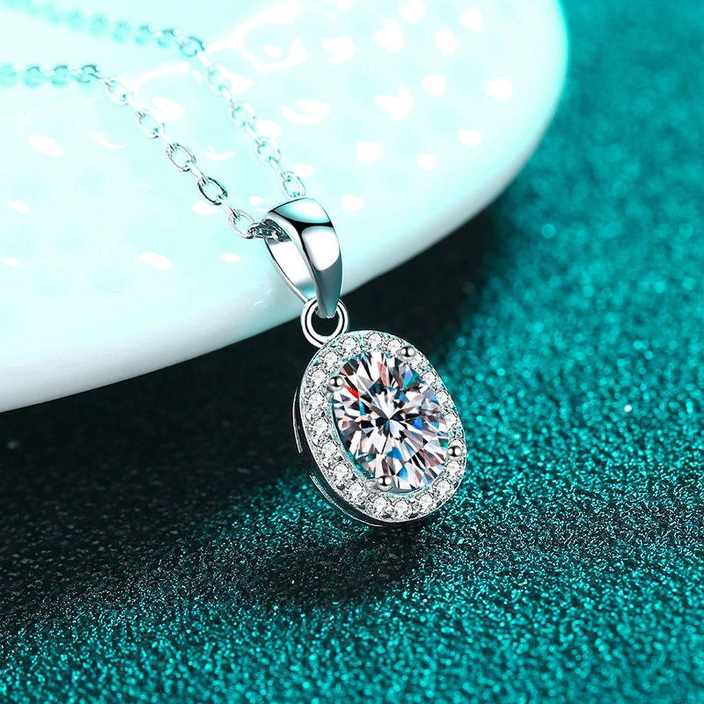 Oval Halo Moissanite Pendant Necklace with CZ in Rhodium-Plated S925 sterling silver product scene view showing chain and setting detail