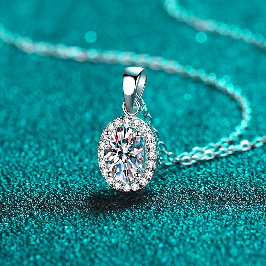 Oval Halo Moissanite Pendant Necklace with CZ in Rhodium-Plated S925 sterling silver product scene view showing angled sparkle