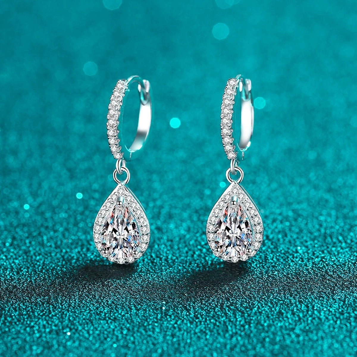 Pear Moissanite Hoop Dangle Earrings with CZ in Rhodium-Plated S925 sterling silver product scene view showing front sparkle, moissanite setting, and hoop dangle earrings design