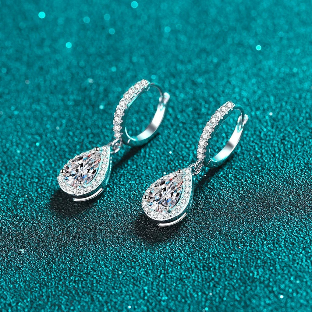 Pear Moissanite Hoop Dangle Earrings with CZ in Rhodium-Plated S925 sterling silver product scene view showing angled setting detail, moissanite setting, and hoop dangle earrings design