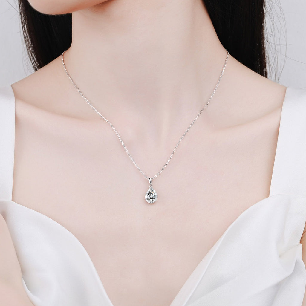 Pear Cut Halo Moissanite Pendant Necklace with CZ in Rhodium-Plated S925 sterling silver neckline model view showing pendant scale and adjustable chain