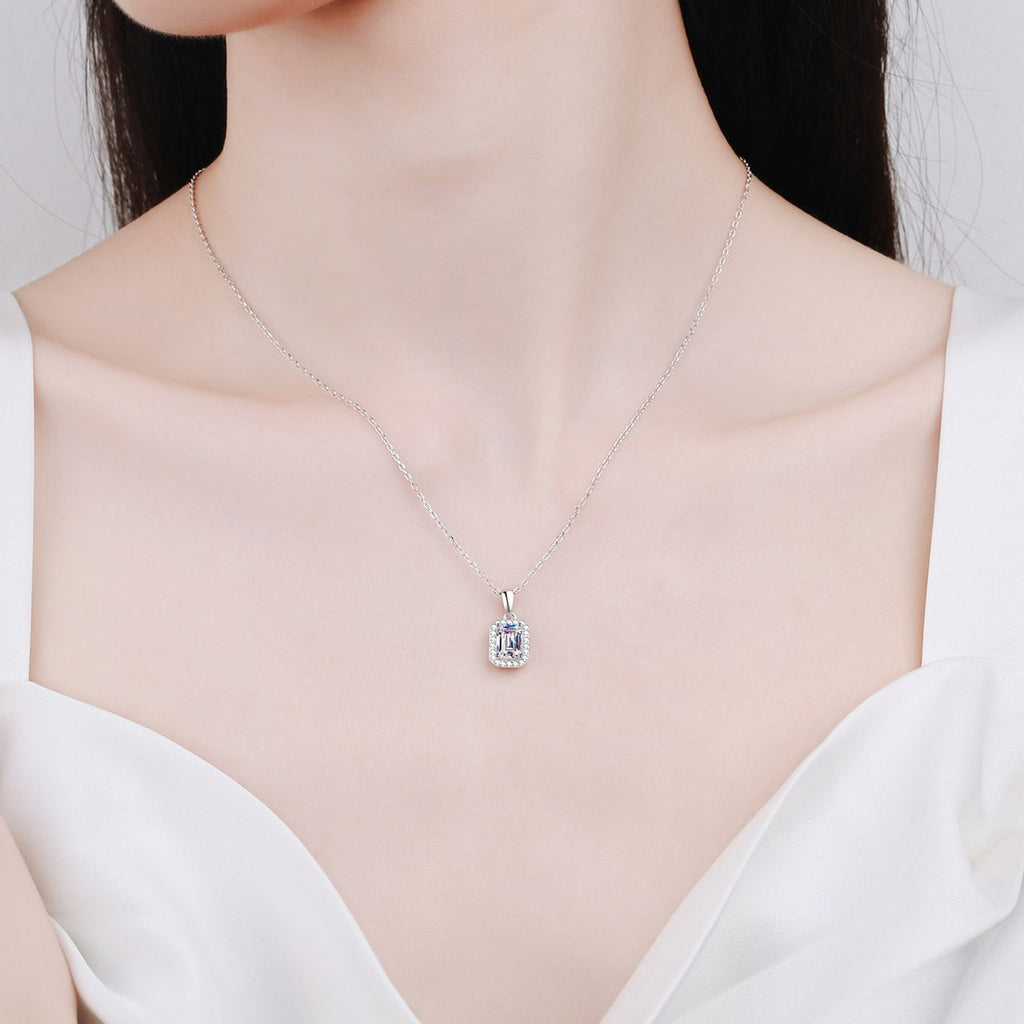Emerald and Radiant Cut Moissanite Pendant Necklace with CZ in Rhodium-Plated S925 sterling silver neckline model view showing pendant scale and adjustable chain