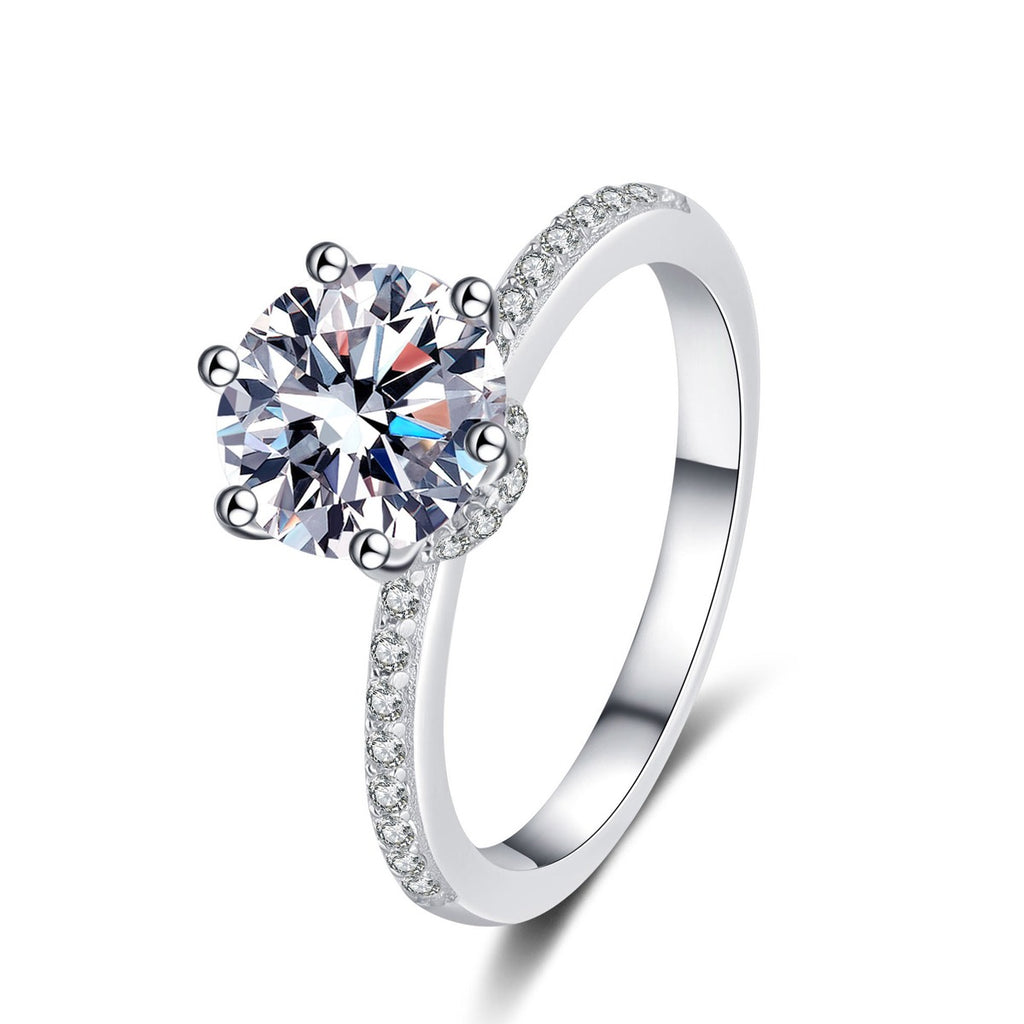 Round Moissanite Ring with CZ in rhodium-plated S925 sterling silver on clean white background