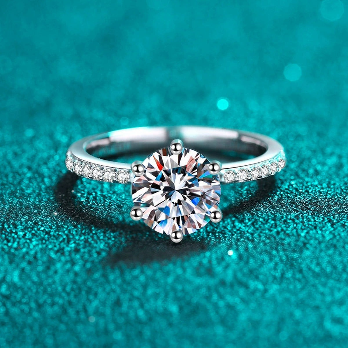 Round Moissanite Ring with CZ product view showing moissanite setting and rhodium finish