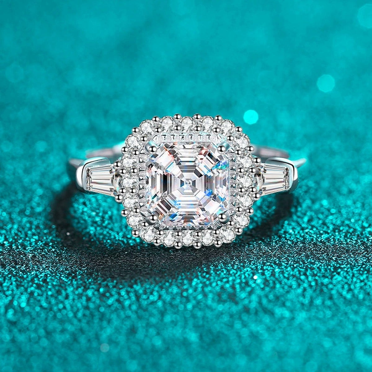 Asscher Cut Moissanite Halo Engagement Ring with CZ in Rhodium-Plated S925 Sterling Silver blue display product photo showing the moissanite setting, stone cut, and band profile