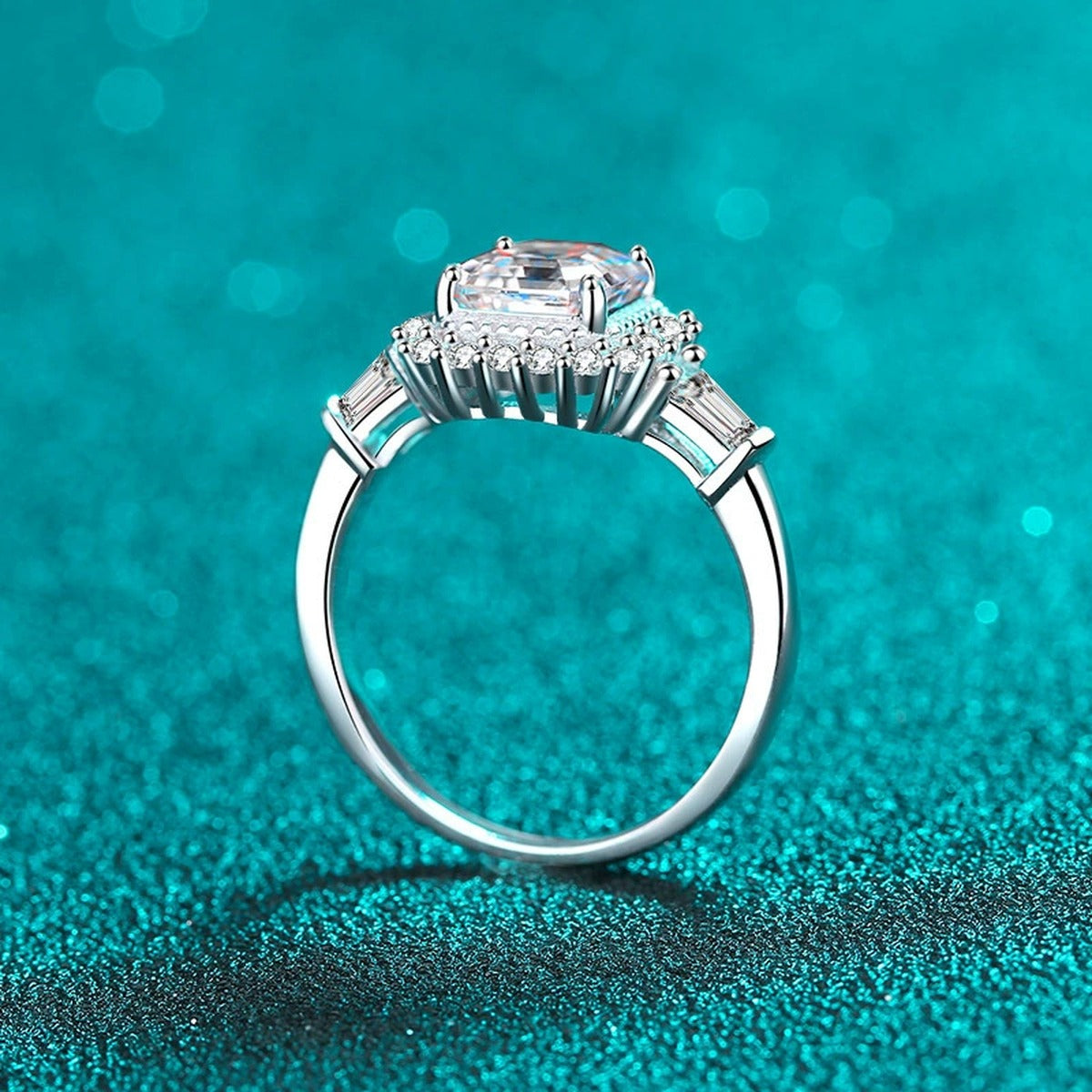 Asscher Cut Moissanite Halo Engagement Ring with CZ in Rhodium-Plated S925 Sterling Silver blue display product photo showing the moissanite setting, stone cut, and band profile