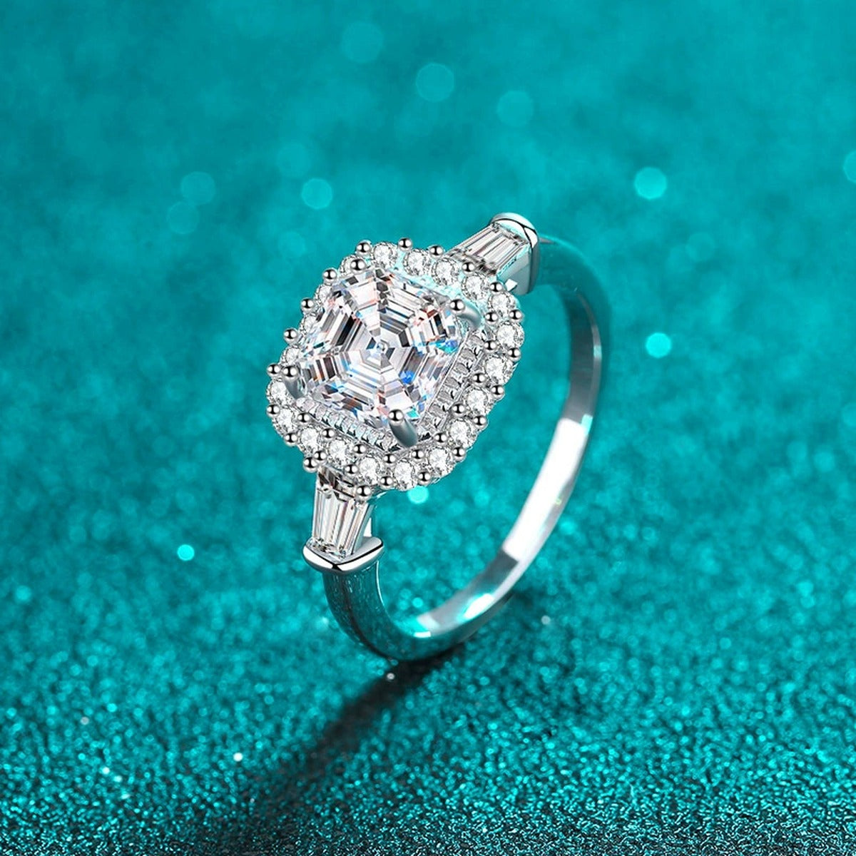 Asscher Cut Moissanite Halo Engagement Ring with CZ in Rhodium-Plated S925 Sterling Silver blue display product photo showing the moissanite setting, stone cut, and band profile