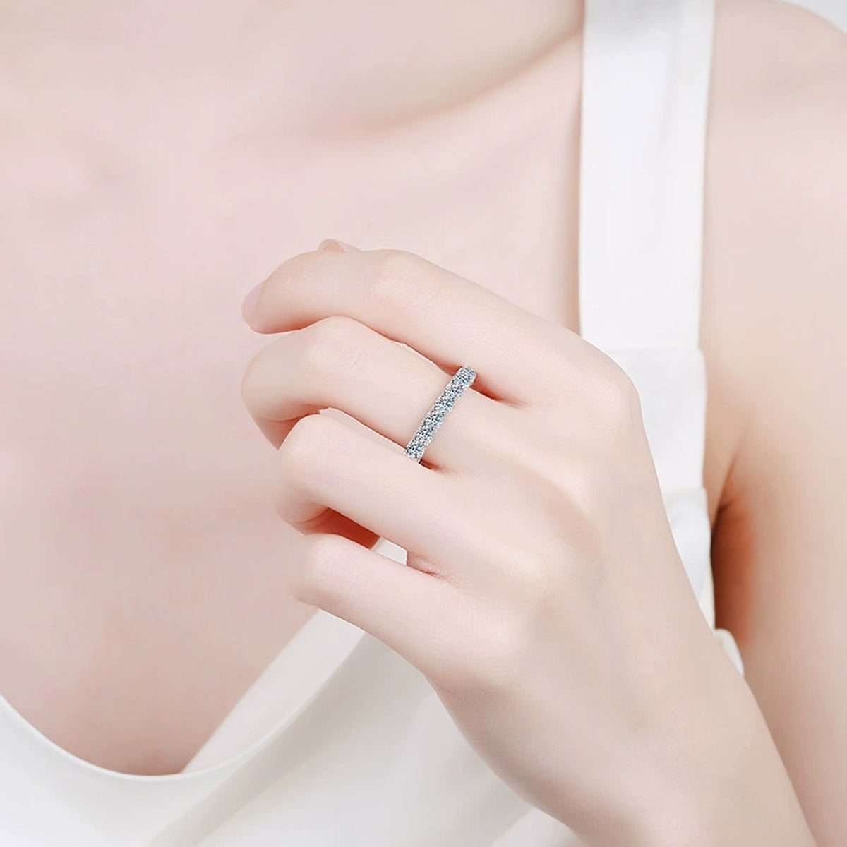 Round Moissanite Eternity Band Ring worn on hand to show scale and ring profile