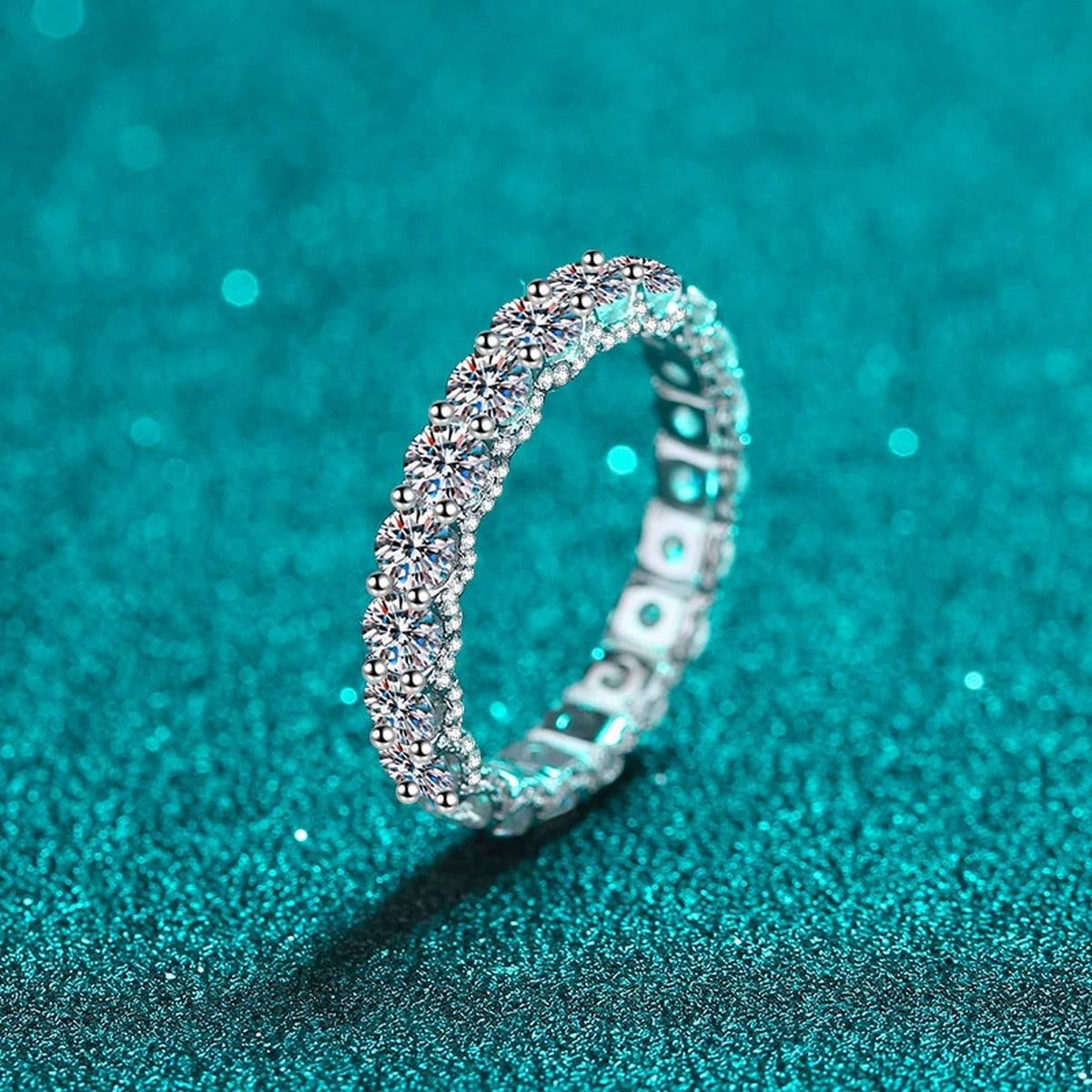 Round Moissanite Eternity Band Ring product view showing moissanite setting and rhodium finish