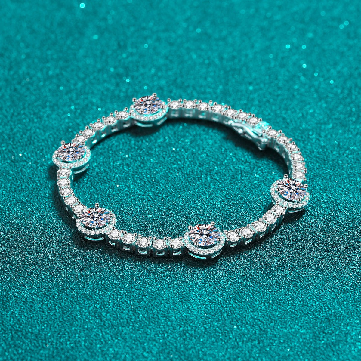 Halo Station Moissanite Bracelet in Rhodium-Plated S925 sterling silver styled product scene showing stone sparkle and chain detail