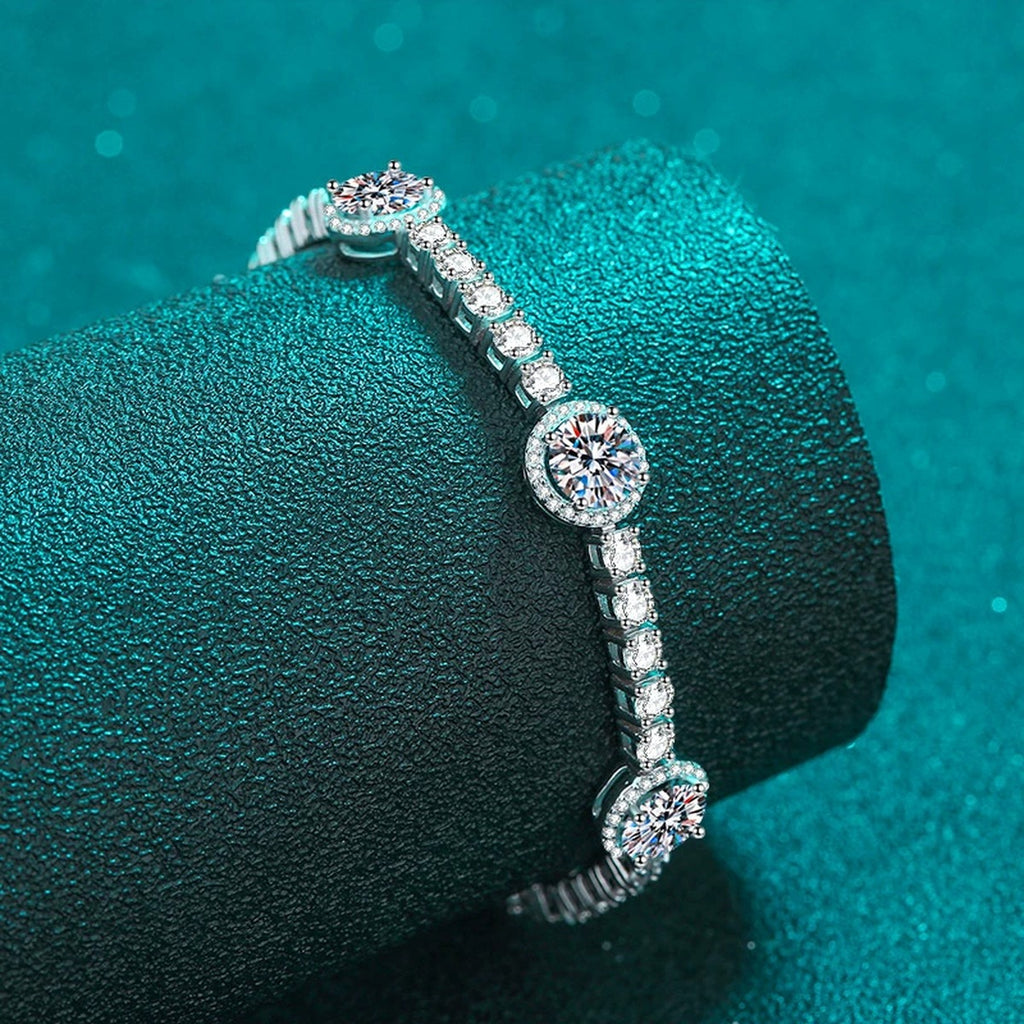 Halo Station Moissanite Bracelet in Rhodium-Plated S925 sterling silver angled product display showing bracelet silhouette