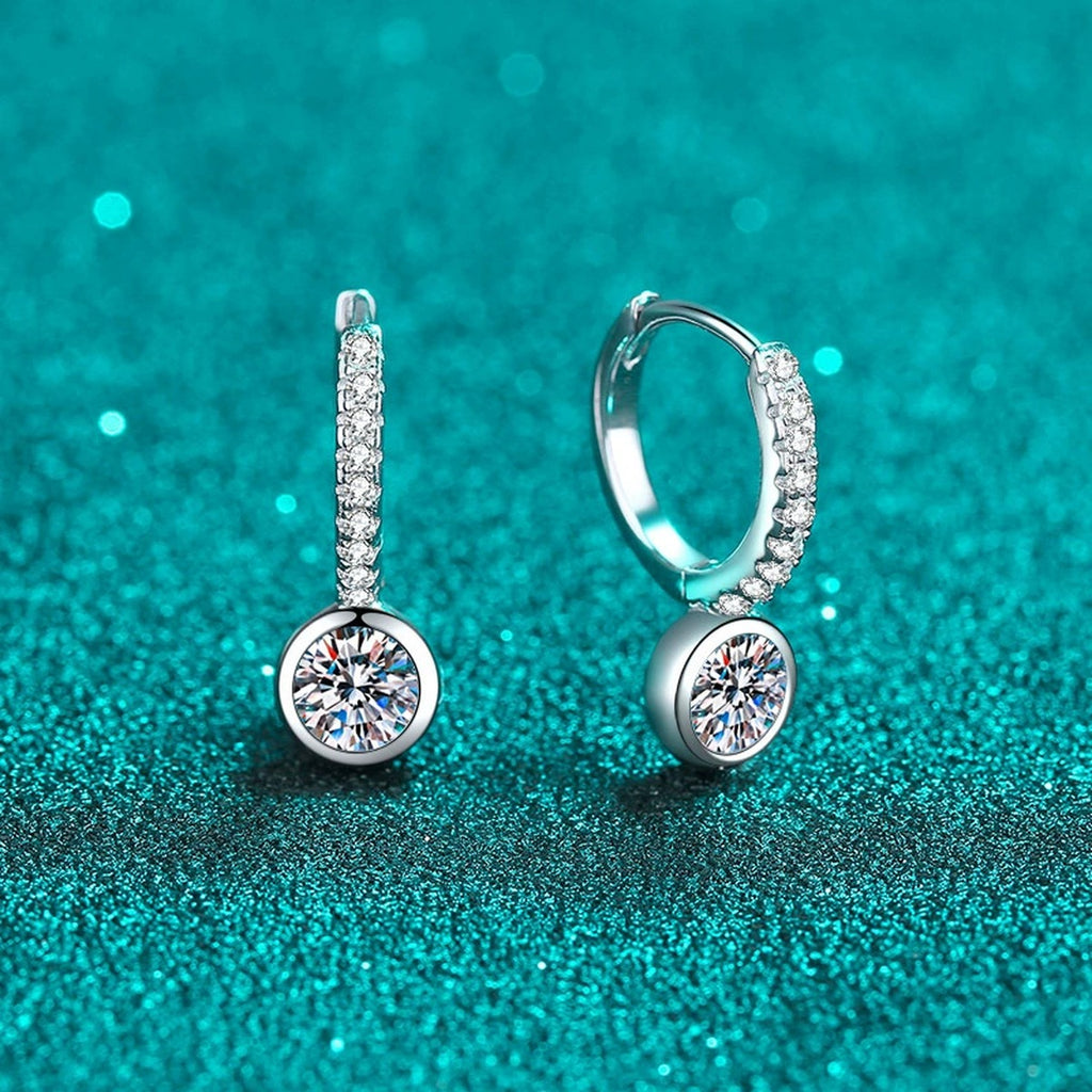 Round Moissanite Hoop Drop Earrings with CZ in Rhodium-Plated S925 sterling silver product scene view showing angled setting detail, moissanite setting, and hoop drop earrings design