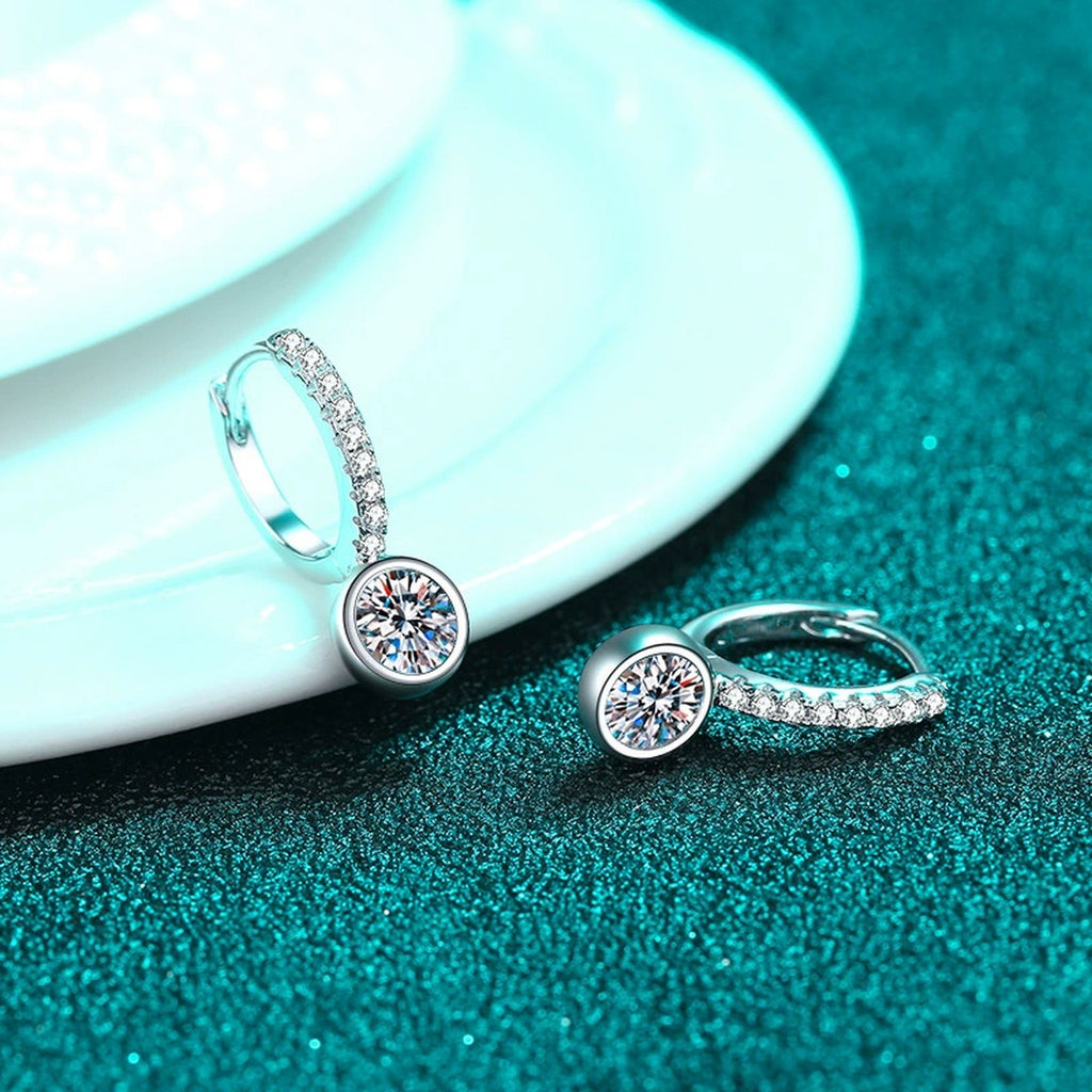 Round Moissanite Hoop Drop Earrings with CZ in Rhodium-Plated S925 sterling silver product scene view showing side profile, moissanite setting, and hoop drop earrings design