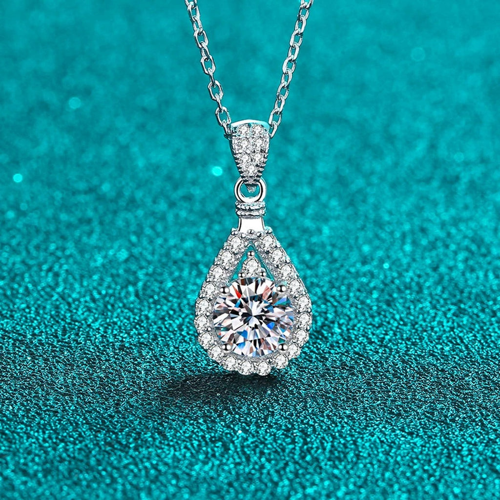 Teardrop Halo Round Moissanite Necklace with CZ in Rhodium-Plated S925 sterling silver close-up product scene showing pendant setting