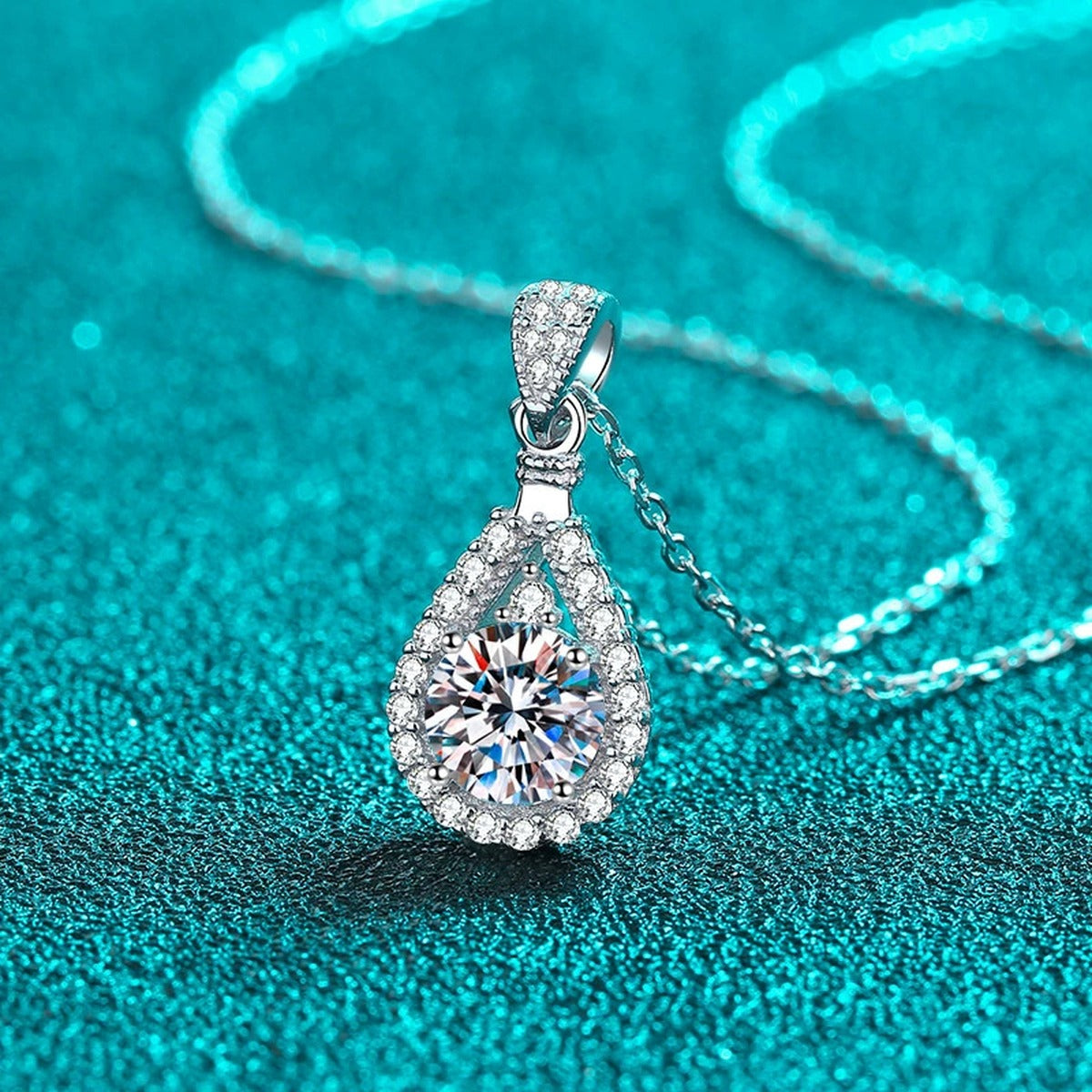 Teardrop Halo Round Moissanite Necklace with CZ in Rhodium-Plated S925 sterling silver angled product detail view