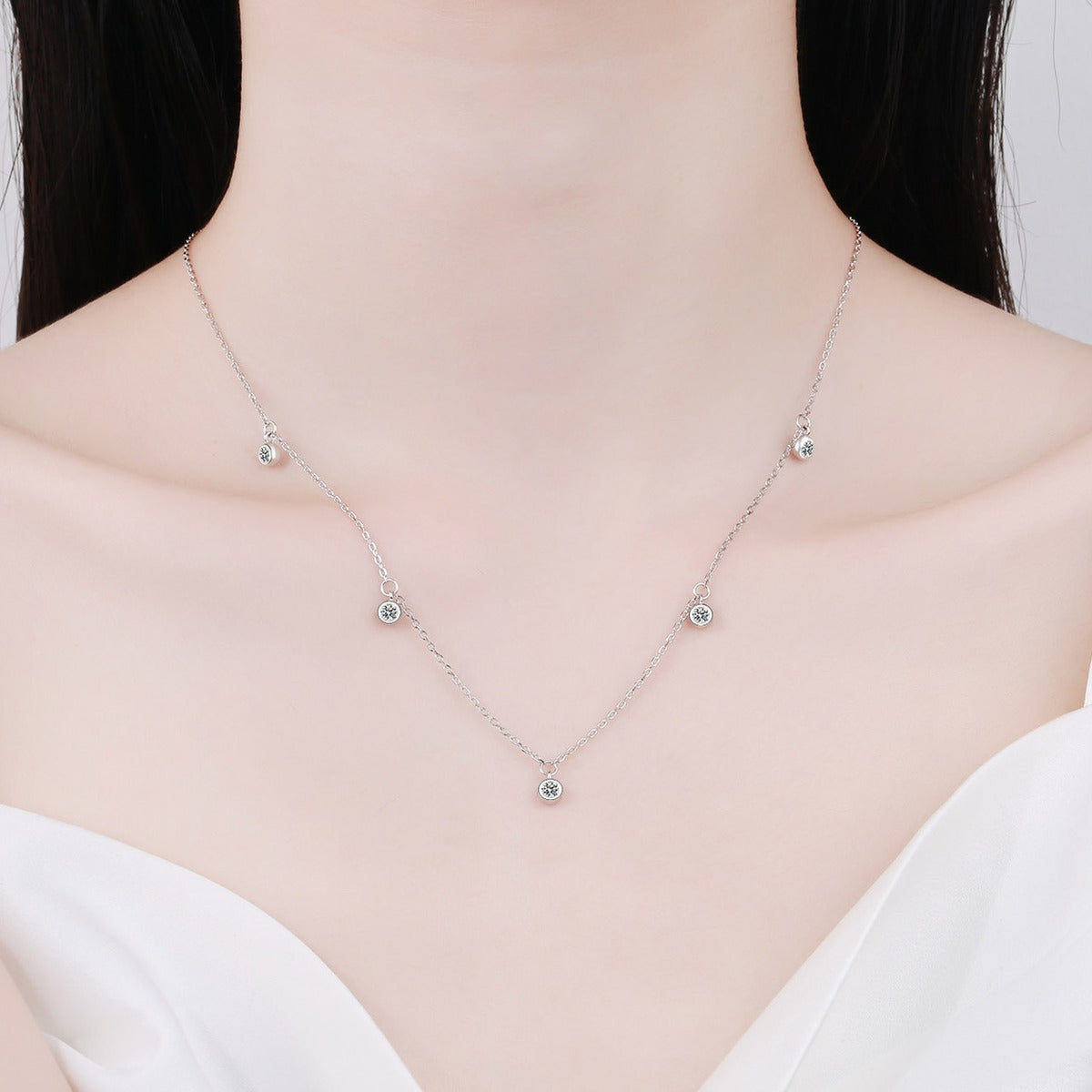 Bead Charm Moissanite Pendant Necklace in Rhodium-Plated S925 sterling silver neckline model view showing pendant scale and adjustable chain