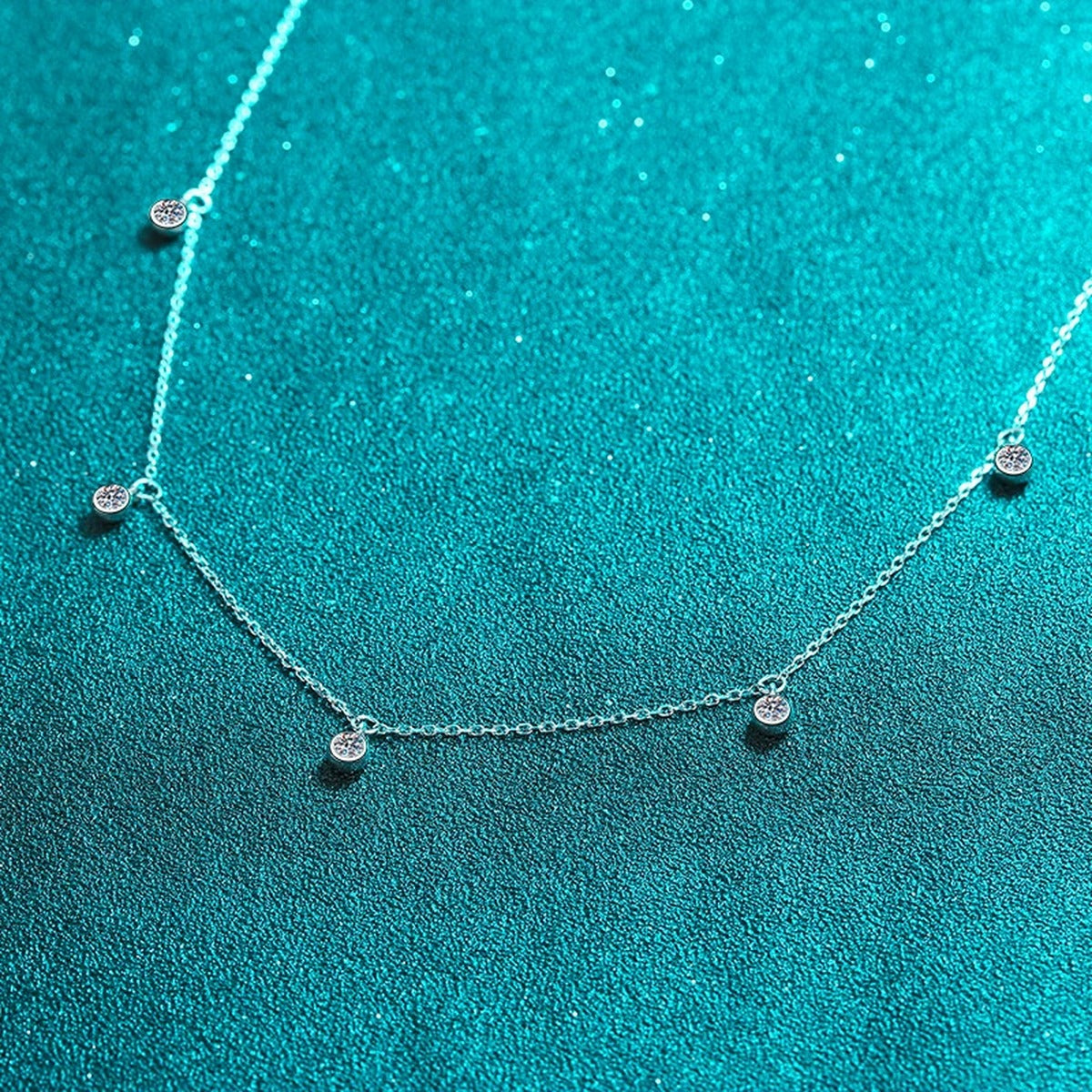 Bead Charm Moissanite Pendant Necklace in Rhodium-Plated S925 sterling silver angled product detail view