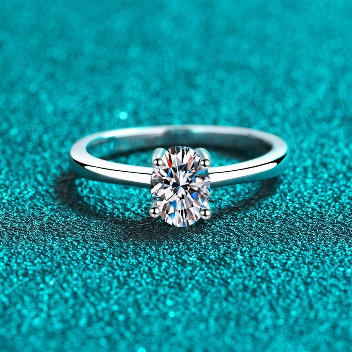 Oval Cut Moissanite Ring product view showing moissanite setting and rhodium finish