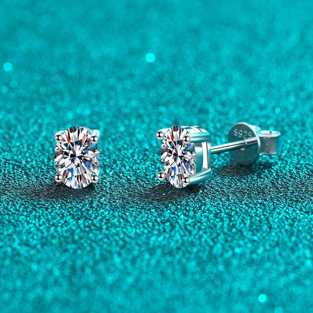 Oval Moissanite Stud Earrings in Rhodium-Plated S925 sterling silver product scene view showing front sparkle