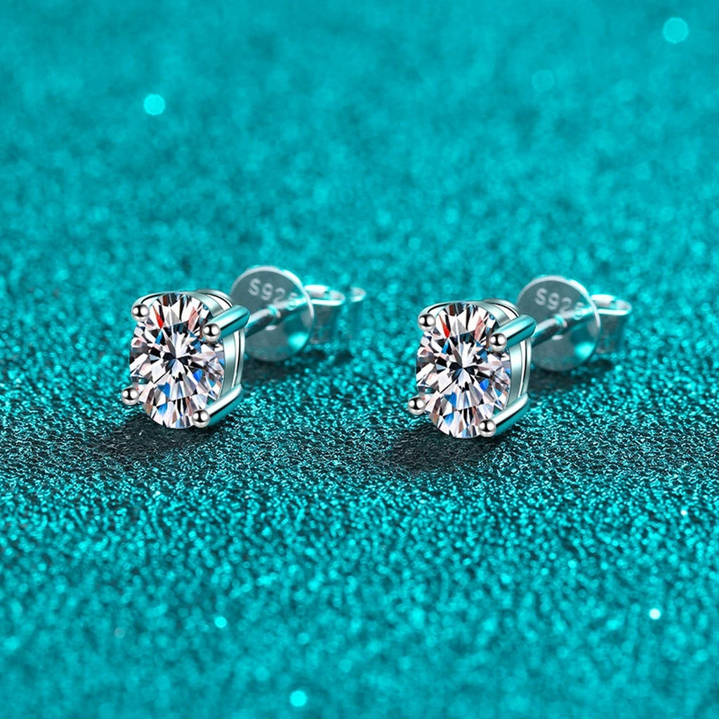 Oval Moissanite Stud Earrings in Rhodium-Plated S925 sterling silver product scene view showing angled setting detail