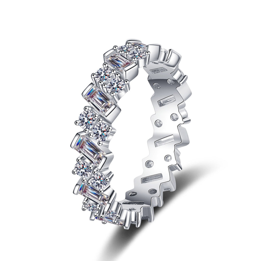 Round and Emerald Cut Moissanite Eternity Ring in rhodium-plated S925 sterling silver on clean white background