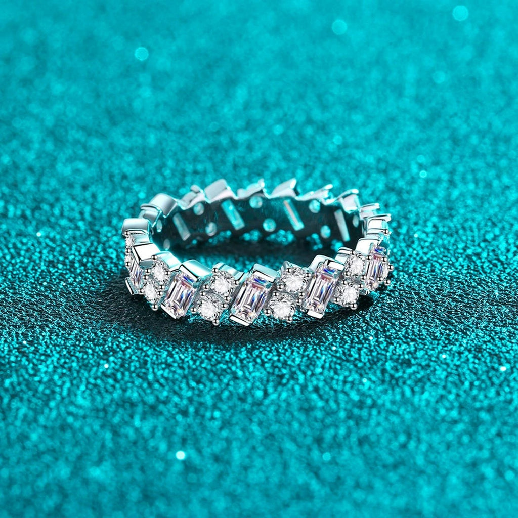 Round and Emerald Cut Moissanite Eternity Ring product view showing moissanite setting and rhodium finish