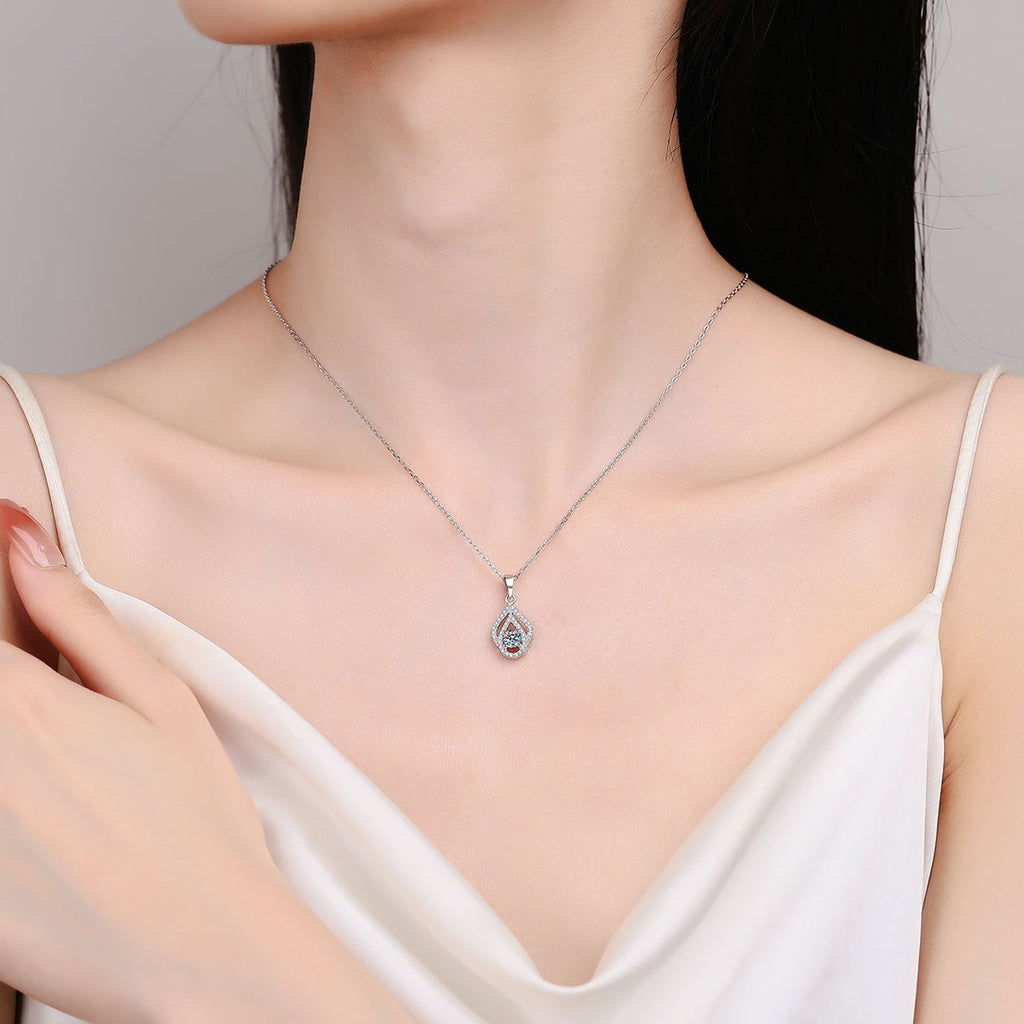 Teardrop Moissanite Pendant Necklace with CZ in Rhodium-Plated S925 sterling silver neckline model view showing pendant scale and adjustable chain