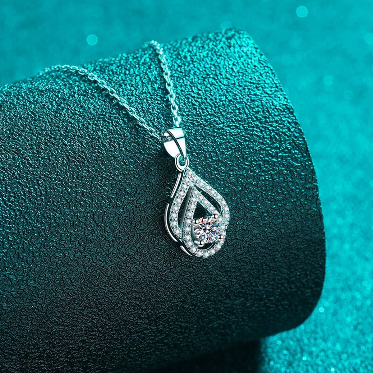 Teardrop Moissanite Pendant Necklace with CZ in Rhodium-Plated S925 sterling silver close-up product scene showing pendant setting