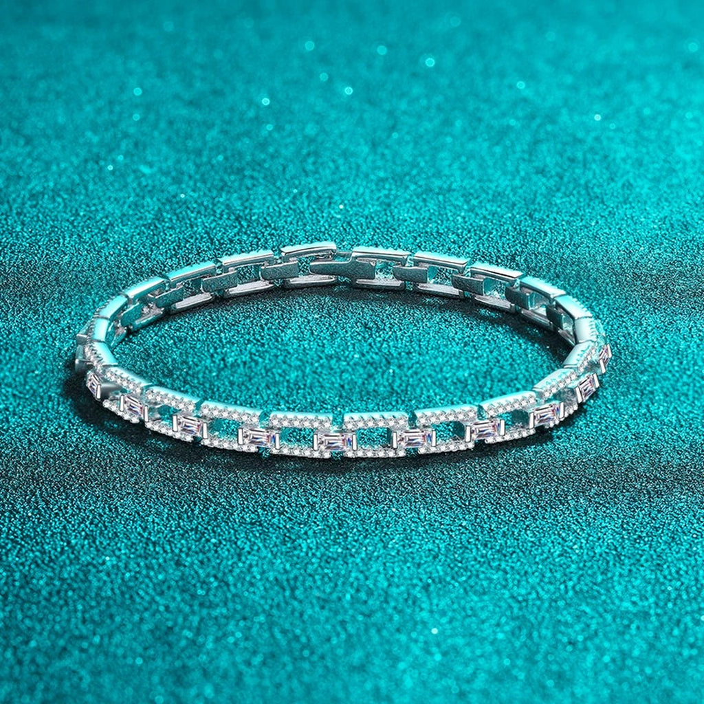 Emerald and Round Moissanite Tennis Bracelet in Rhodium-Plated S925 sterling silver styled product scene showing stone sparkle and chain detail