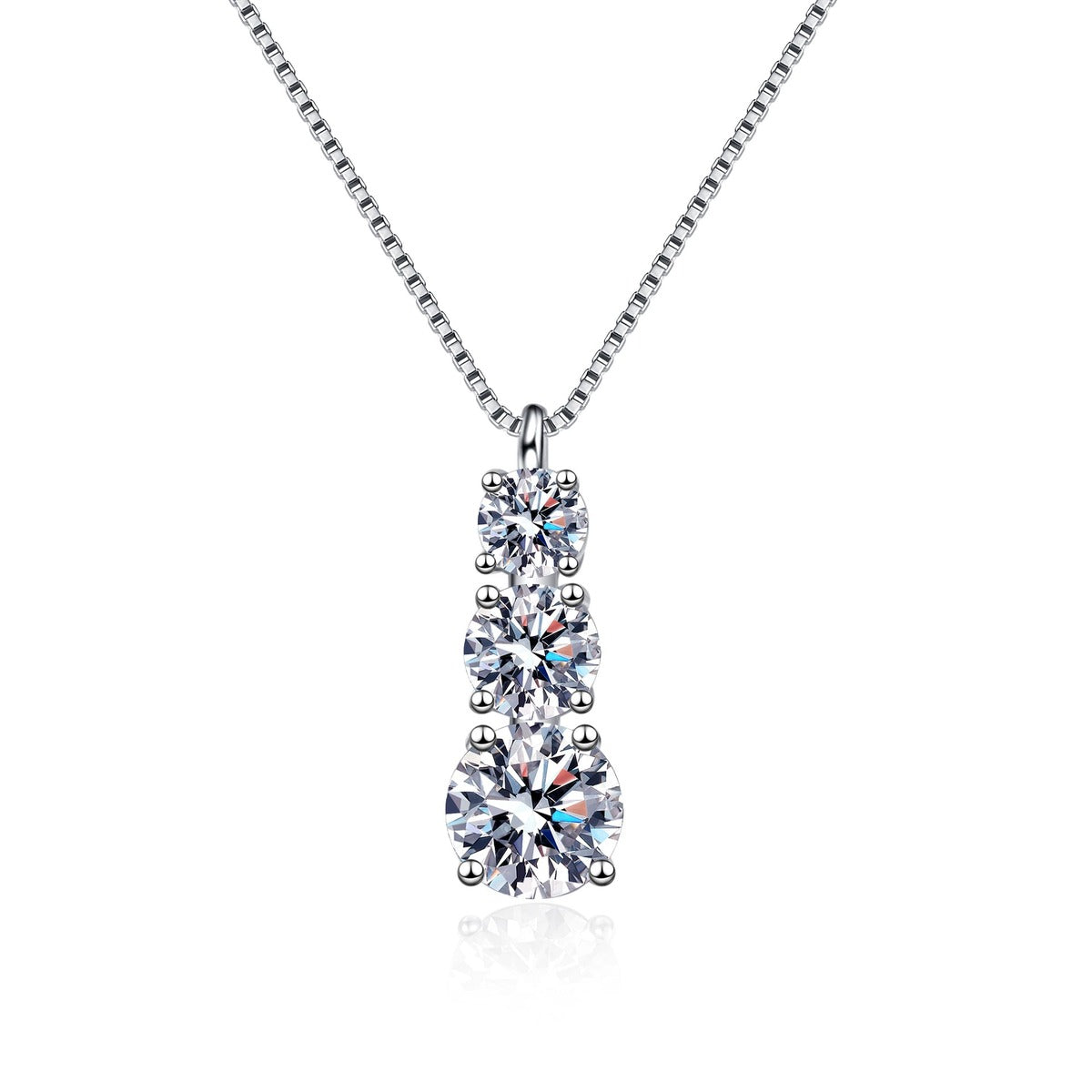 Graduated Moissanite Pendant Necklace in Rhodium-Plated S925 sterling silver white background product photo showing vertical graduated pendant with round moissanite stones in several sizes
