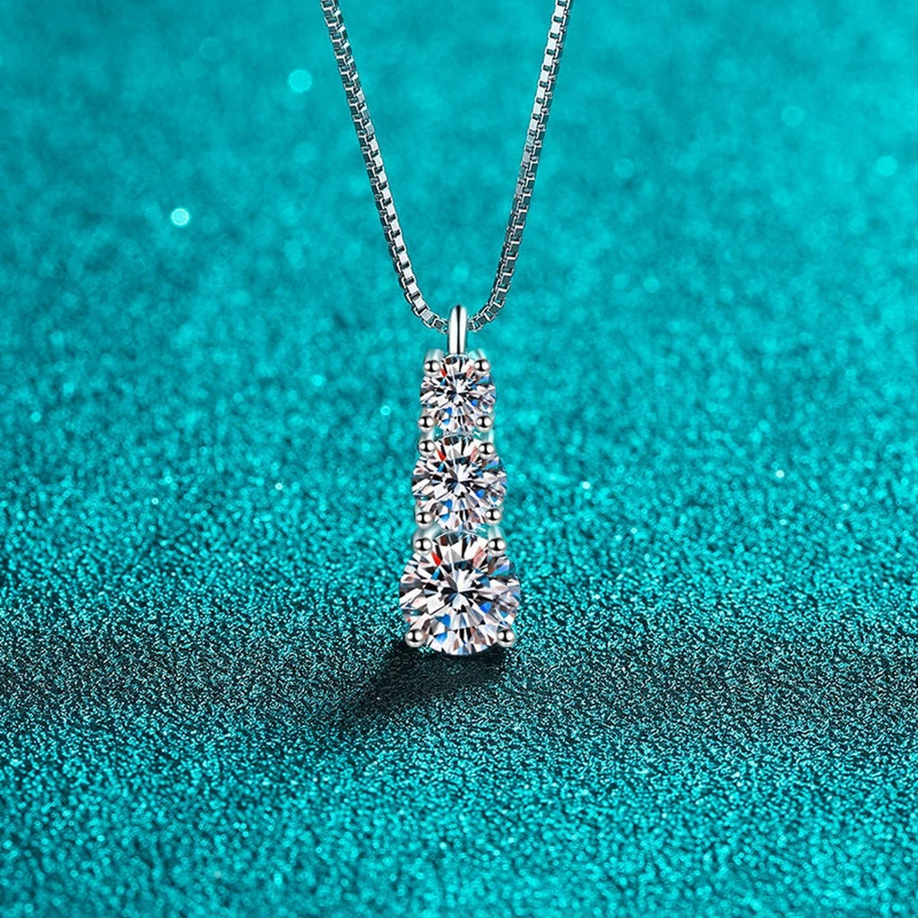 Graduated Moissanite Pendant Necklace in Rhodium-Plated S925 sterling silver close-up product scene showing pendant setting