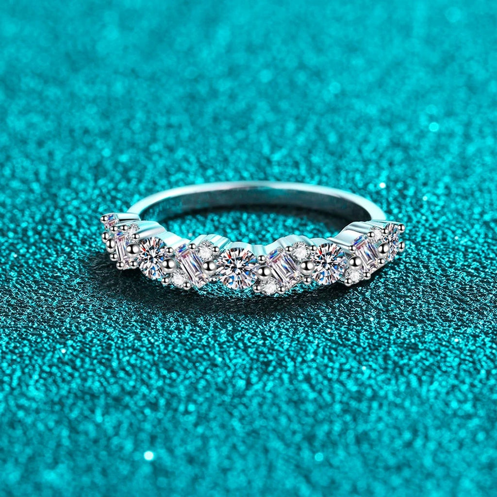 Round Moissanite Twist Band Ring product view showing moissanite setting and rhodium finish