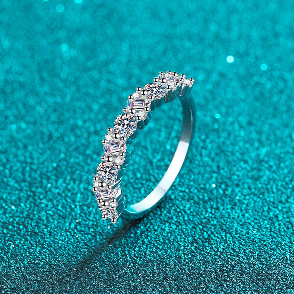 Round Moissanite Twist Band Ring product view showing moissanite setting and rhodium finish