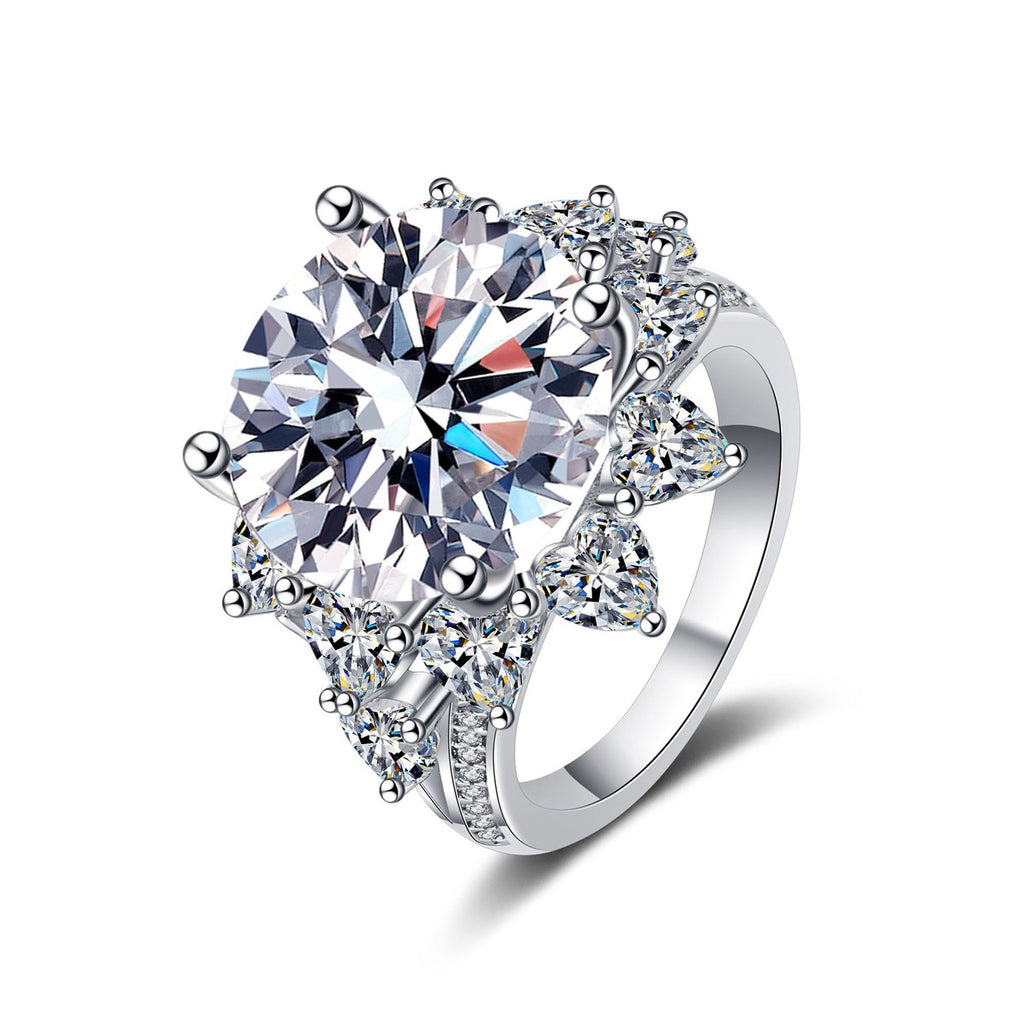Round Moissanite Statement Ring with CZ in rhodium-plated S925 sterling silver on clean white background