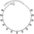 Moissanite Charm Station Bracelet in Rhodium-Plated S925 sterling silver white background product photo showing bracelet shape and moissanite setting