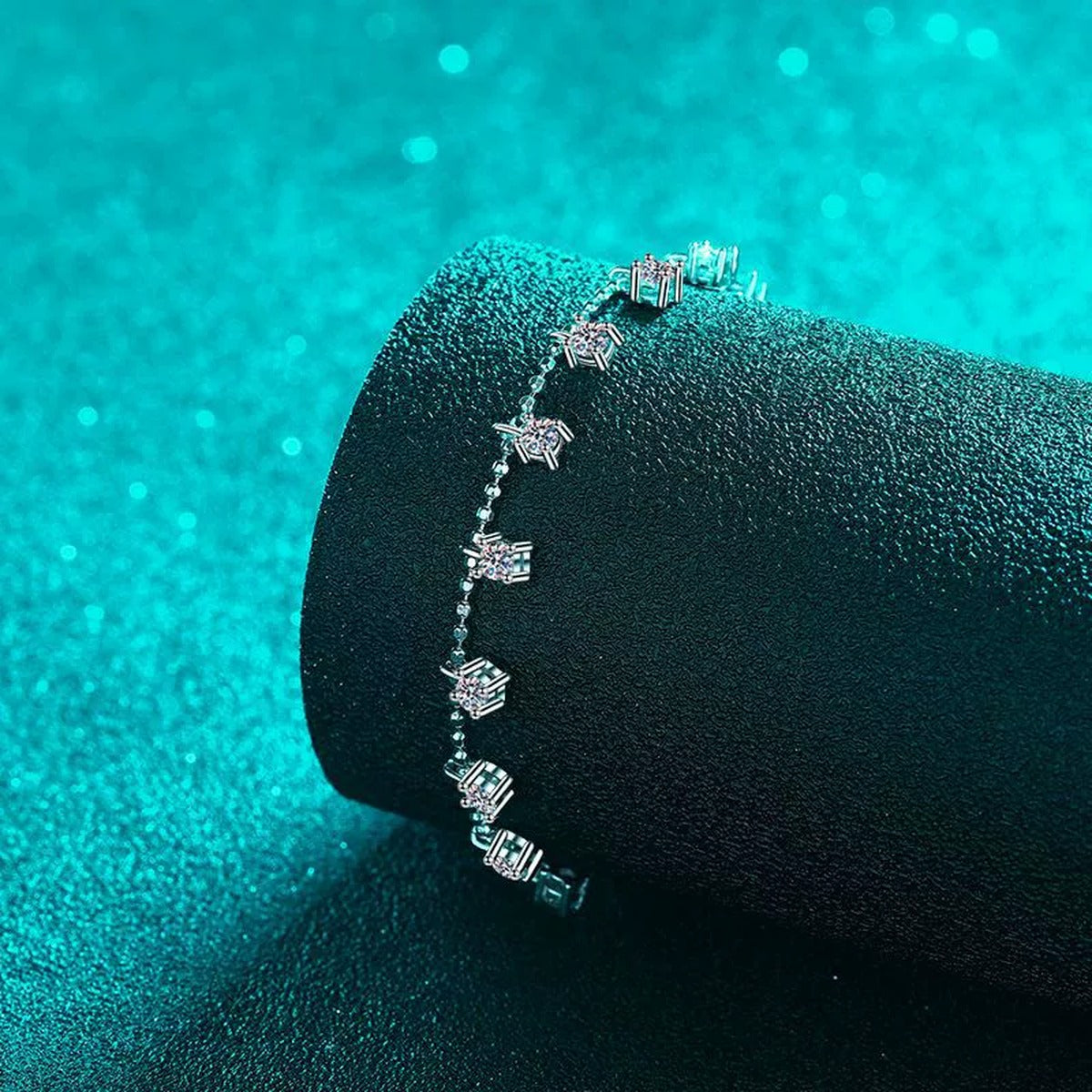 Moissanite Charm Station Bracelet in Rhodium-Plated S925 sterling silver close-up bracelet detail view showing clasp and motif