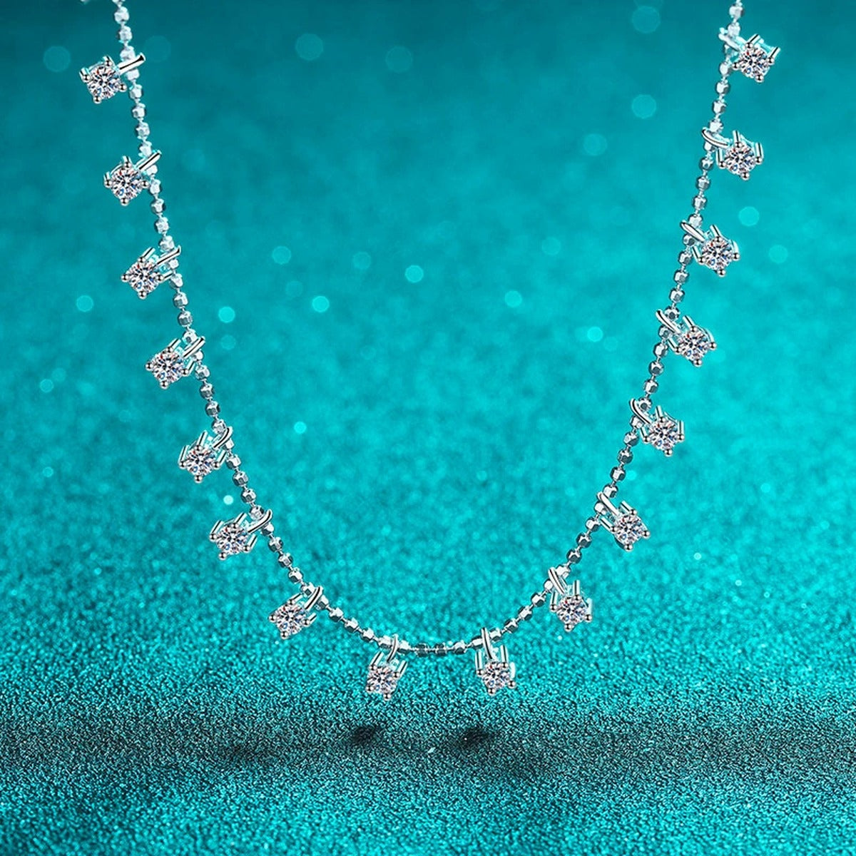 Multi-Stone Moissanite Charm Necklace in Rhodium-Plated S925 sterling silver blue display scene showing chain and stone layout