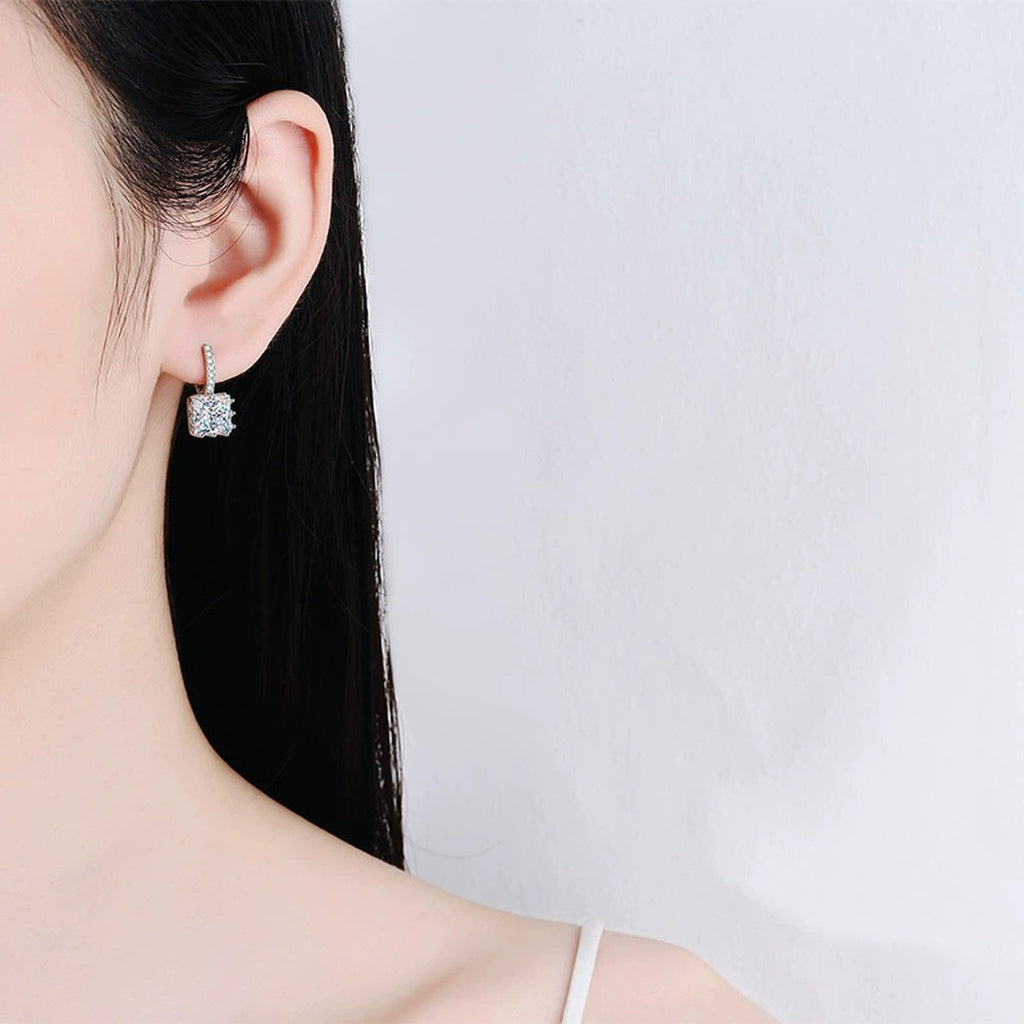 Princess Cut Moissanite Hoop Drop Earrings with CZ in Rhodium-Plated S925 sterling silver worn on ear by model showing scale, placement, and hoop drop earrings styling