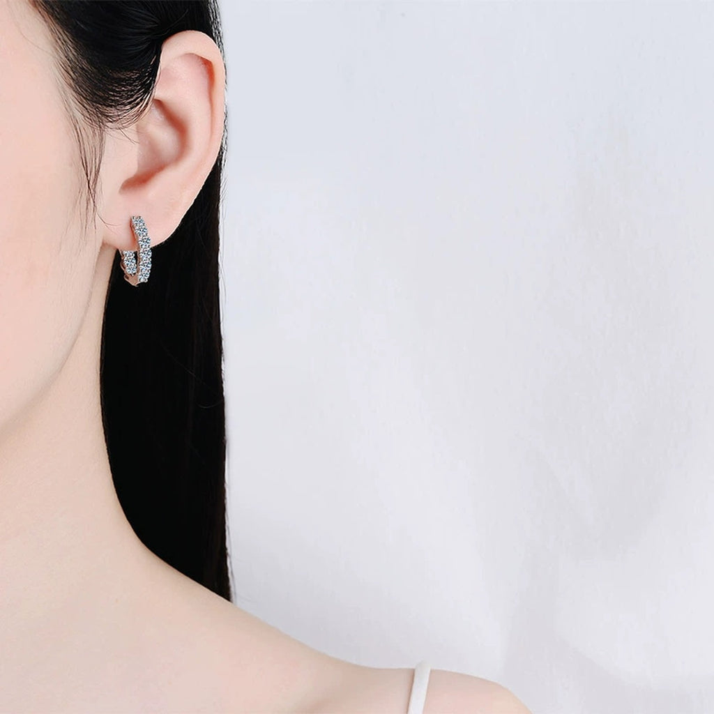 Split Pave Moissanite Hoop Earrings in Rhodium-Plated S925 sterling silver worn on ear by model showing scale, placement, and hoop earrings styling