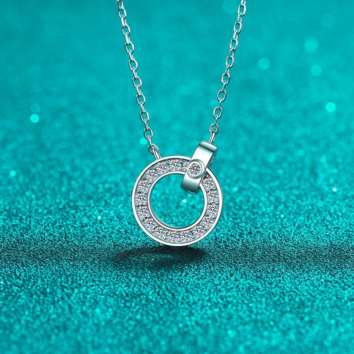 Circle Lock Moissanite Pendant Necklace in Rhodium-Plated S925 sterling silver close-up product scene showing pendant setting